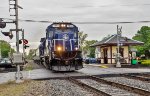 PAR 7542 leads the final Pan Am Office Car special past the MBTA commuter station in Shirley